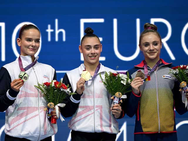 Britain's Alice Kinsella (L), Britain's Jessica Gadirova (C) and Romania's Sabrina Maneca-Voinea celebrate at the end of the Women's floor final during the 2023 Artistic Gymnastics European Championships in Antalya. (Getty Images)