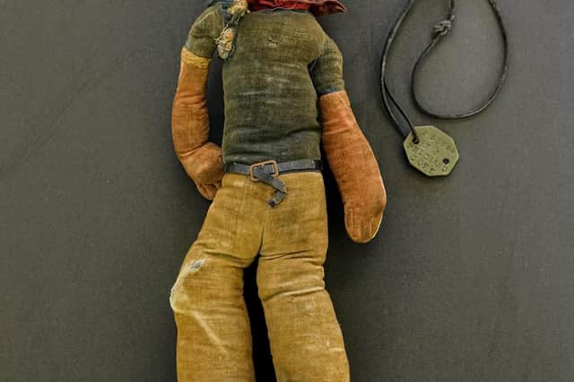 Prichard's Popeye mascot and his identity tag