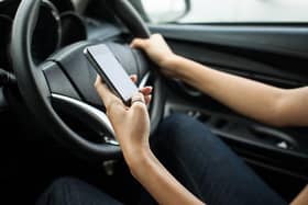 photo from Shutterstock, the laws are now stricker on mobile phone use in Aylesbury and beyond