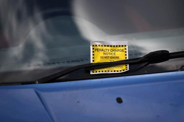 A Penalty Charge Notice (PCN) (Photo by Daniel LEAL / AFP) (Photo by DANIEL LEAL/AFP via Getty Images)