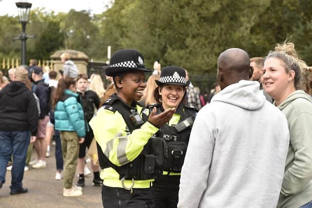 Thames Valley Police officers on duty and meeting members of the public