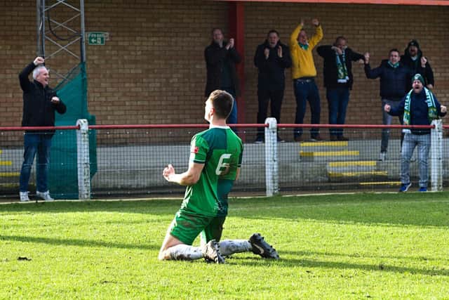 Mark Riddick celebrates scoring the winning goal in front of Aylesbury's fans. Photo: Mike Snell.