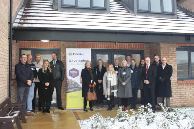 Fairhive directors and staff with representatives of the builders and designers at the opening