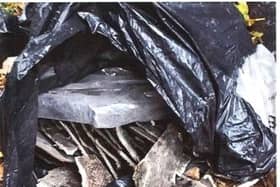 Asbestos was found among the dumped materials