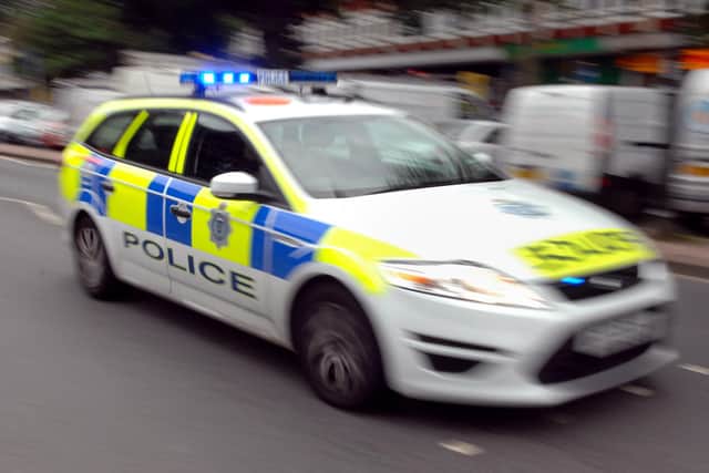 A woman who was hit by a police motorbike escorting a royal family member has died