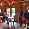 Greg Smith MP opens the Potting Shed Cafe with general manager Matt Philcox and adult care clients Matthew and Glen
