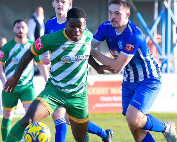 Aylesbury United's Pow Raposo in action against Thame. Pic: Mike Snell.