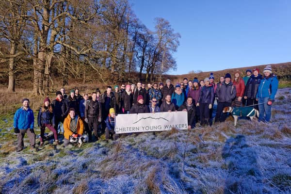 The Chiltern Young Walkers (and 2 dogs!) pose in a frosty field to mark the anniversary