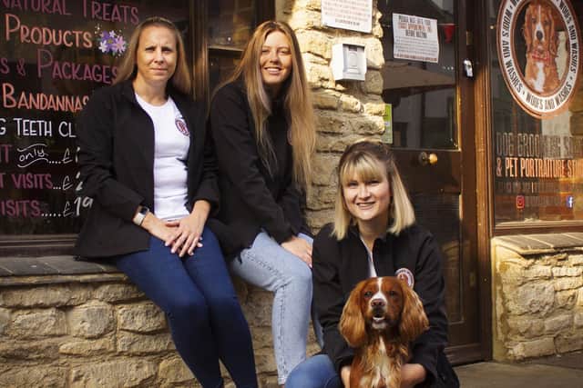The Woofs and Washes team outside the shop