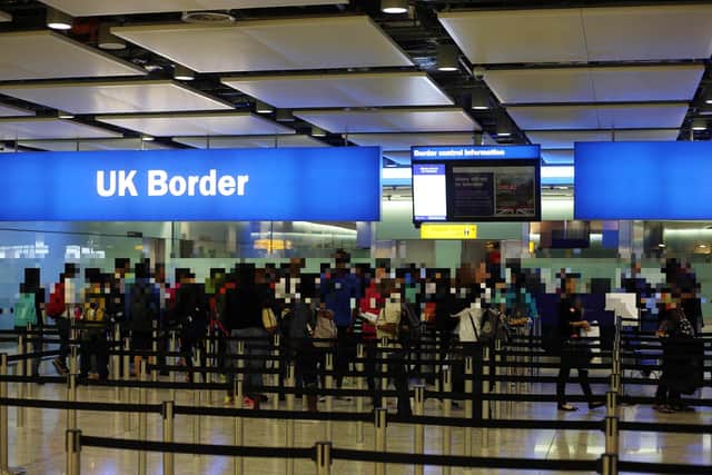 General view of passengers going through UK Border at Terminal 2 of Heathrow Airport. PRESS ASSOCIATION Photo. Picture date: Wednesday July 22, 2015. See PA story . Photo credit should read: Steve Parsons/PA Wire