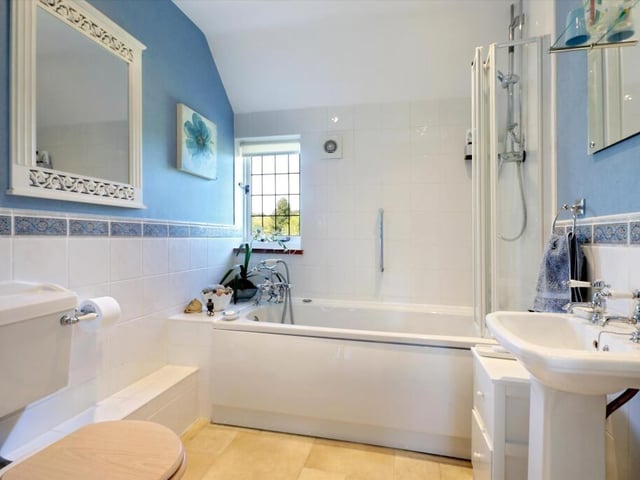 The family bathroom. The home further benefits from solar panels which generate an annual income of circa £1,000-£1,500.