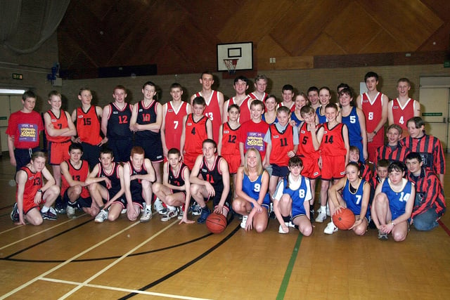 Basketball teams from Sutton Centre posse for a team pic in 2002.
