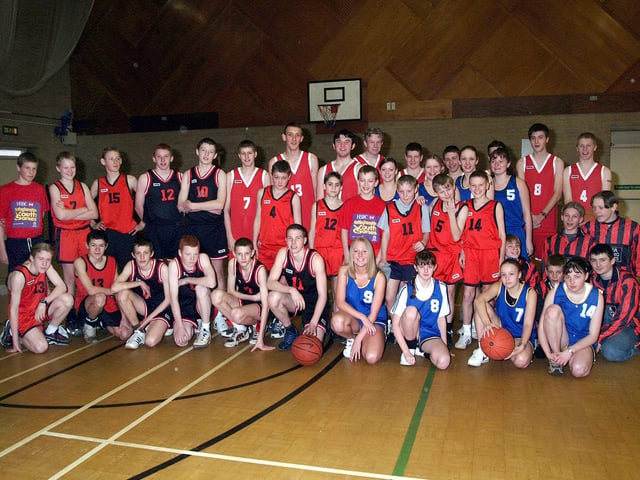 Basketball teams from Sutton Centre posse for a team pic in 2002.