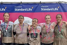 Partou Chiltern Avenue team members after completing the Race for Life Watford Pretty Muddy 5k in aid of Cancer Research UK