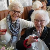 A Clarendon House resident enjoys the celebrations with her daughter