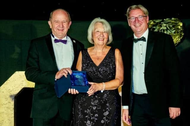 Peter and Rosemary Frohock with their award, presented by Matt Birtwistle