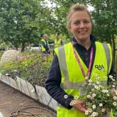 Amy Moffett helps plant up the show garden at Horatio's Garden Chelsea
