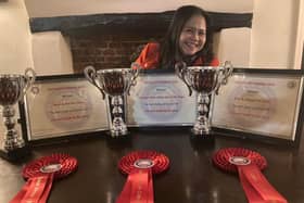 Pie chef Rodelia Manley with her awards at the Bell Hotel and Pie Shop