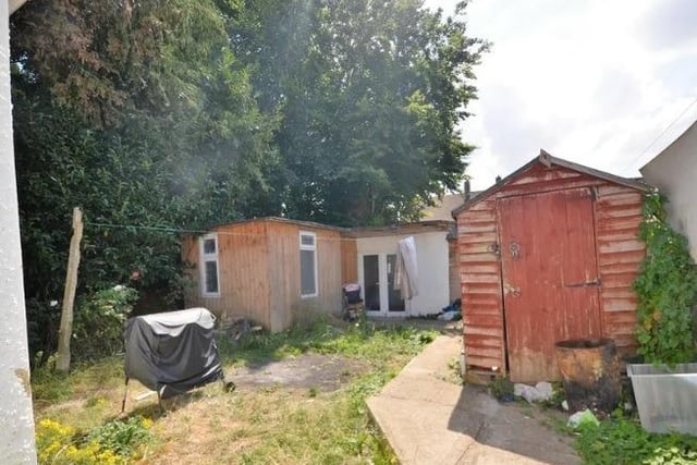 The private garden which comes with the property, containing an extra storage room and separate shed.