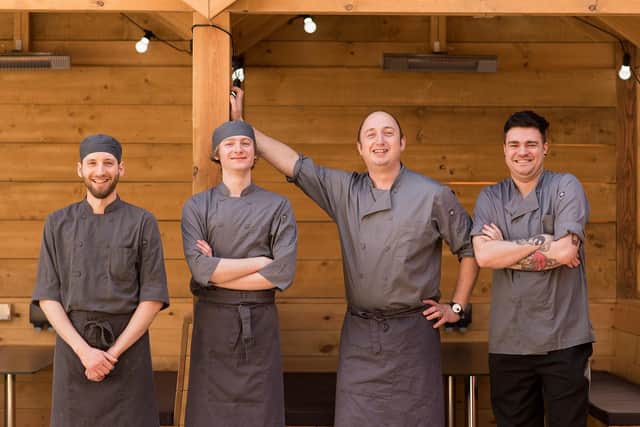 The chefs, including owner Chris Fox, second from right
