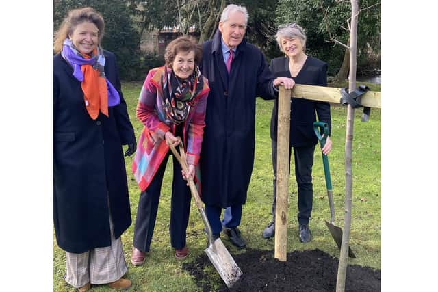 Deputy Lord Lieutenant Carolyn Cumming planting the tree with husband Robert, with president of the Thomas Jefferson Foundation Leslie Greene Bowman, right, and past chair of the University of Buckingham Council Milly Soames, left