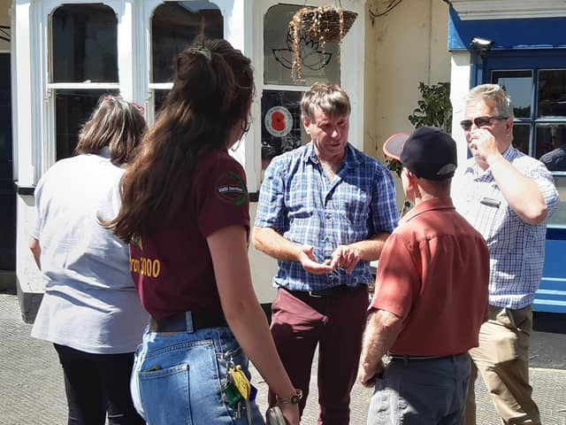 Lynda and Andy Eadon talk to people in Winslow town centre