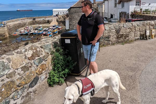 Ben Johnstone with Sophie the hearing dog