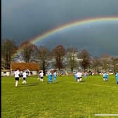 The weather ruled on Saturday although one game at Oving was blessed with a rainbow and some sunshine. Photo submitted.