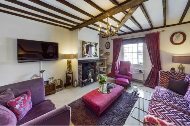 The sitting room with exposed beams