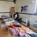 Local parents host a children's clothing swap to promote sustainable living.