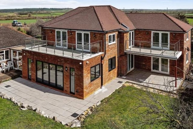 A look at the property's balcony which boasts a view of the surrounding countryside.