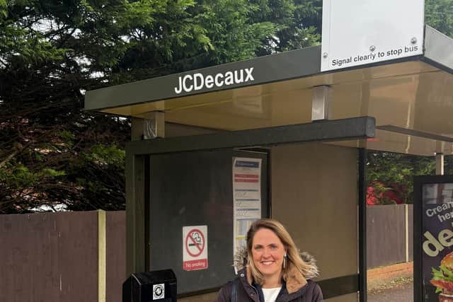 Aylesbury MP Laura Kyrke-Smith at a bus stop in town