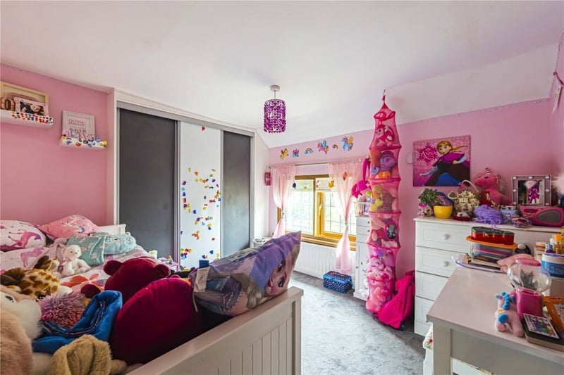 Here's one of the smaller rooms, which is used as a children's room. So it would be ideal for families looking to move straight into a home fit for them.