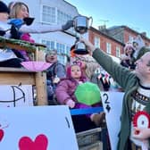 Greg Smith MP hands 1st prize to Field House Day Nursery