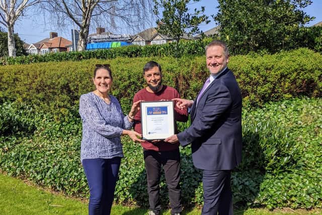 Minibus driver Sakhy Badshah receiving his Proud of Bucks award from Janet Lee (assistant head teacher at Wingrave Church of England School) and Councillor Steven Broadbent