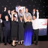 Hightown's VoiceBox group receiving their Great British Care award