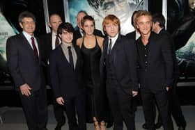 NEW YORK - NOVEMBER 15:  (L-R) Allen Horn, Daniel Radcliffe; Emma Watson, Rupert Grint, Tom Felton and David Heyman attend the premiere of "Harry Potter and the Deathly Hallows - Part 1" at Alice Tully Hall on November 15, 2010 in New York City.  (Photo by Stephen Lovekin/Getty Images)