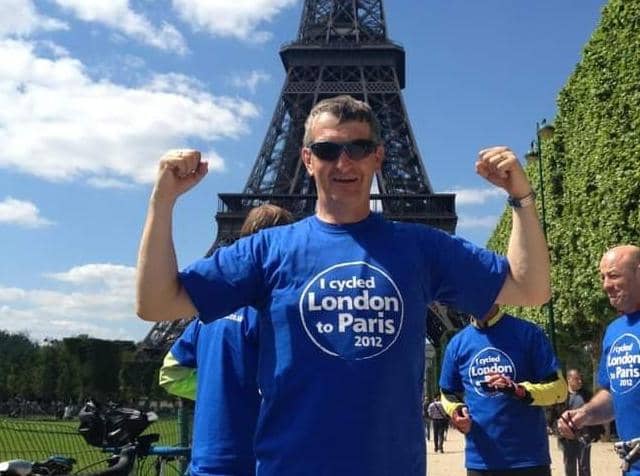 Chris Matthews completing the London to Paris ride in 2012