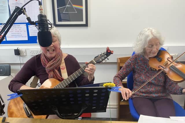 Musicians from Wing and Linslade perform live on air at 3Bs Radio, at Buckingham University