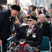 Veterans reminiscing, photo by Derek Pelling