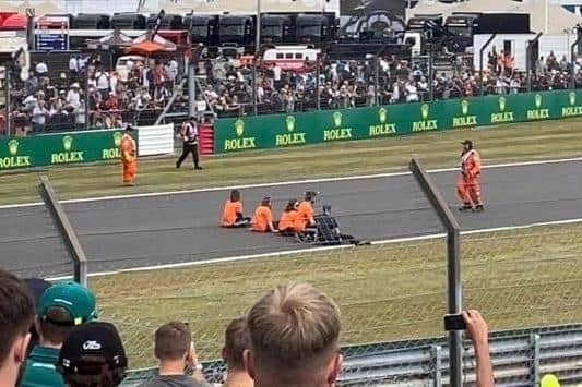 Just Stop Oil protesters breached a massive security operation and sat on the 200mph Wellington Straight at Silverstone during Sunday's British Grand Prix