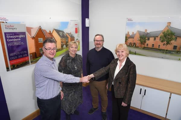 Taylor Wimpey Presenting Cheque