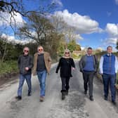 Inspecting the village roads: From left, Cllr Frank Mahon, Cllr Peter Martin, Cllr Angela Macpherson, Cllr Steven Broadbent, Greg Smith MP