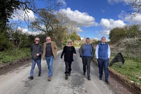 Inspecting the village roads: From left, Cllr Frank Mahon, Cllr Peter Martin, Cllr Angela Macpherson, Cllr Steven Broadbent, Greg Smith MP