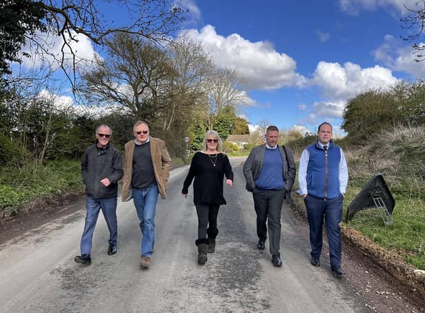 Inspecting the village roads: From left, Cllr Frank Mahon, Cllr Peter Martin, Cllr Angela Macpherson, Cllr Steven Broadbent, Greg Smith MP