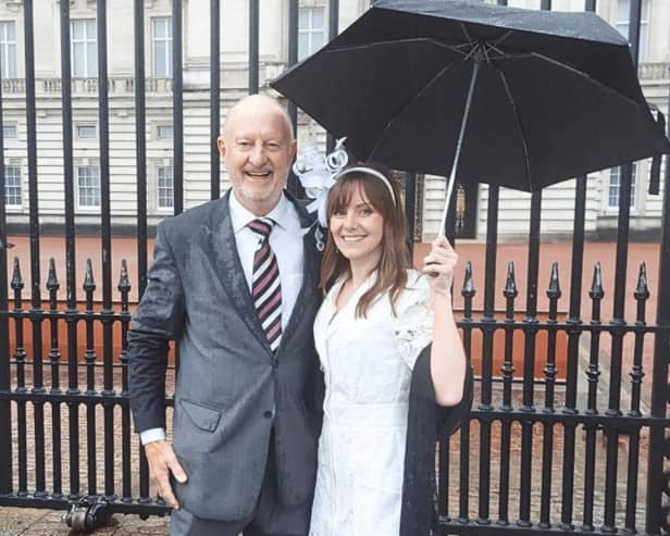 QPAC Volunteers - Dan Sullivan and Hannah Pople outside Buckingham Palace