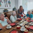 Older people enjoying a Re-engage tea party