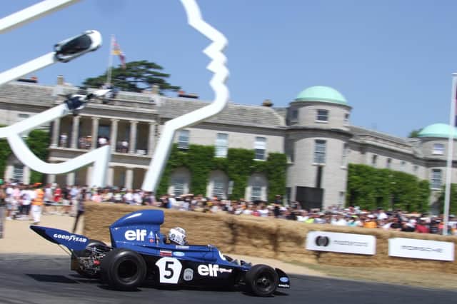 Sir Jackie Stewart's 1973 world championship-winning car in action at Goodwood. Photo - James Beckett.