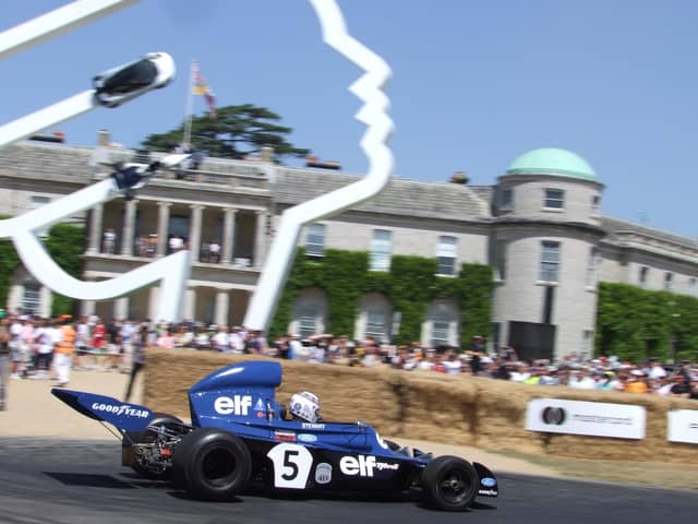 Sir Jackie Stewart's 1973 world championship-winning car in action at Goodwood. Photo - James Beckett.