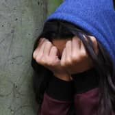 PICTURE POSED BY MODEL of a teenage girl with her head in her hands showing signs of mental health issues. Photo from: Gareth Fuller/PA Wire